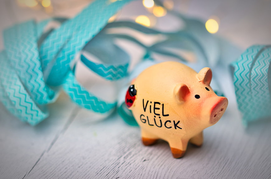 Ceramic Piggy Bank With Viel Glueck Text And Teal Ribbon