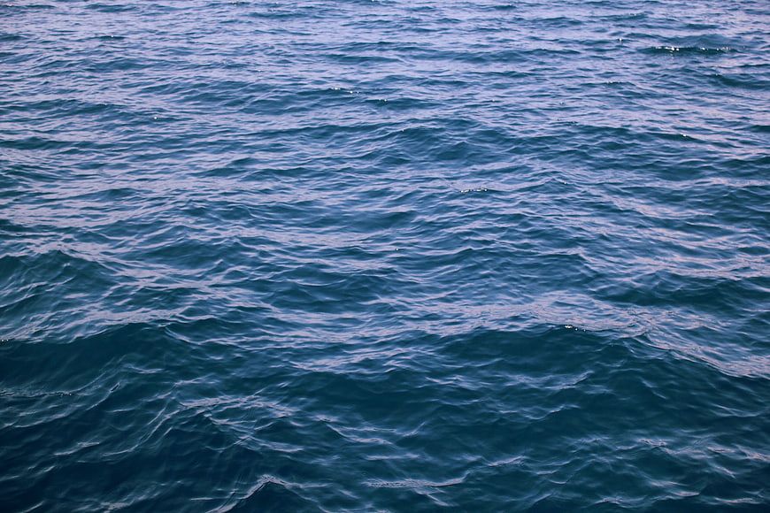 Deep blue ocean waves texture background