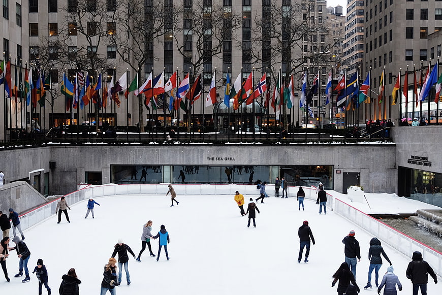 Ice Skating at Rockefeller Center with International Flags