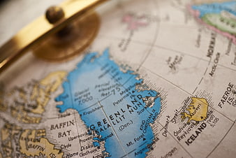 Close-up of vintage map focusing on Greenland and Iceland