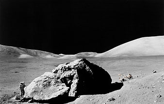 Astronaut and Lunar Rover on Moon Surface
