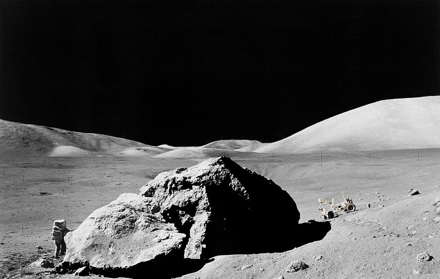 Astronaut and Lunar Rover on Moon Surface