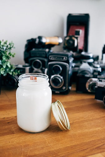 White Soy Candle in Mason Jar with Vintage Cameras