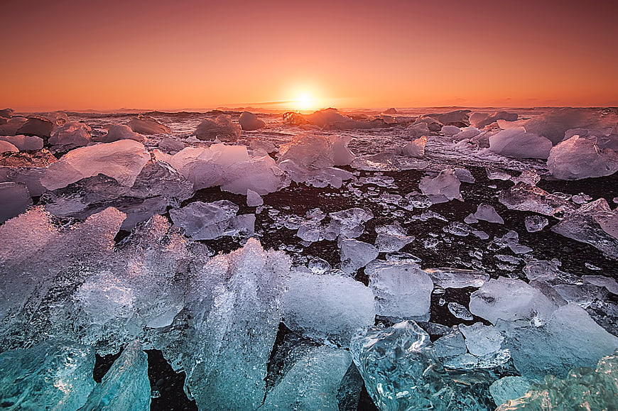 Diamond Beach Iceland Sunset with Icebergs on Black Sand