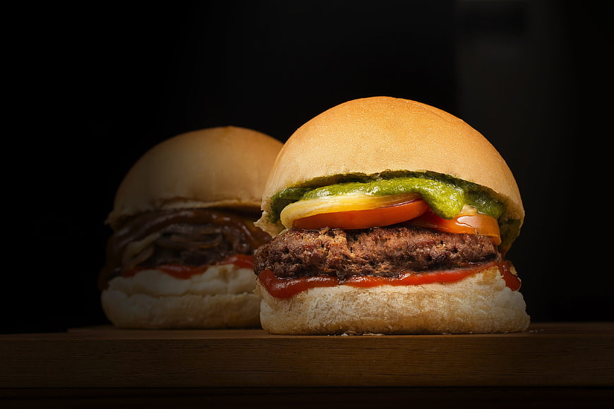 Gourmet Burgers with Fresh Ingredients on Dark Background