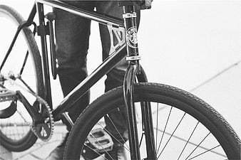 Close-up of black bicycle frame with Starbucks logo