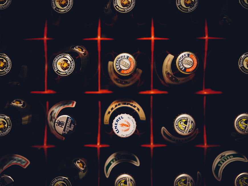 Top View of German Beer Bottles with Red Neon Lights
