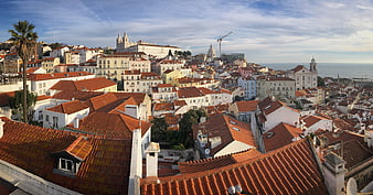 Panoramic View of Lisbon Rooftops and Cathedral