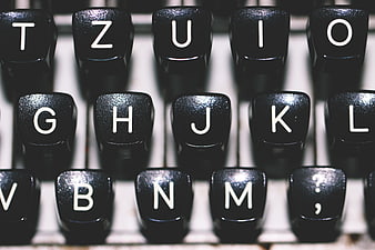 Close-up of vintage typewriter keys with shallow depth of field