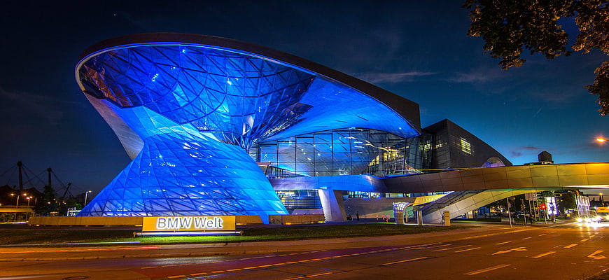 BMW Welt Munich illuminated at night with blue lights