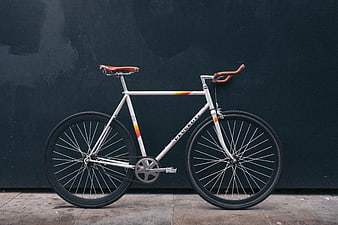 Vintage Peugeot Bicycle Against Dark Wall