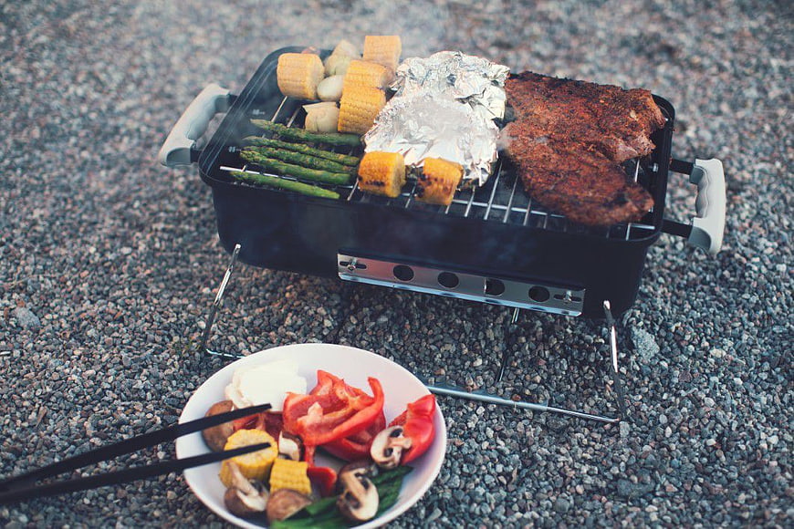 Outdoor Portable BBQ Grill with Steak and Vegetables