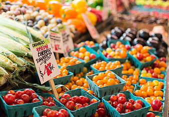 Fresh Organic Cherry Tomatoes and Corn at Farmers Market