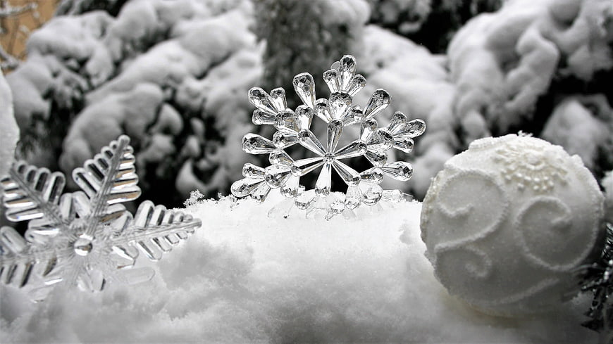 Crystal Snowflake Ornaments on Snowy Winter Background
