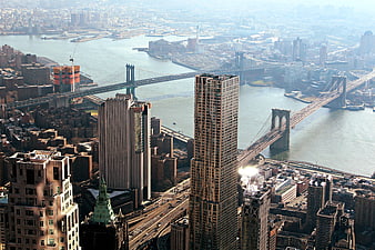 Aerial View of Manhattan Bridges and Skyscrapers