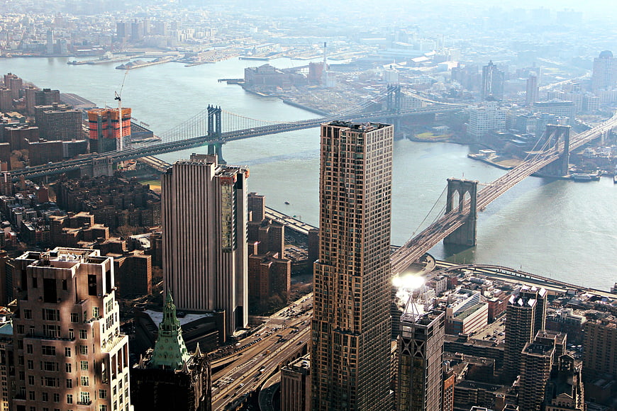 Aerial View of Manhattan Bridges and Skyscrapers
