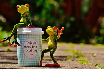 Two Green Ceramic Frogs With Coffee Cup And Positive Message
