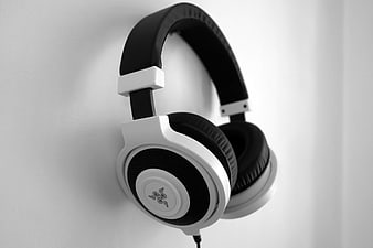 Black and White Razer Gaming Headphones on White Wall