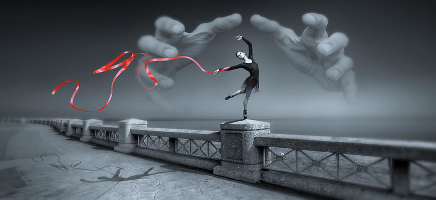 Surreal ballerina with red ribbon and giant hands