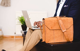 Businessman with Laptop and Leather Briefcase