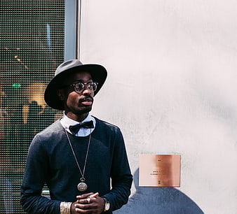 Stylish African American Man in Fedora and Bow Tie