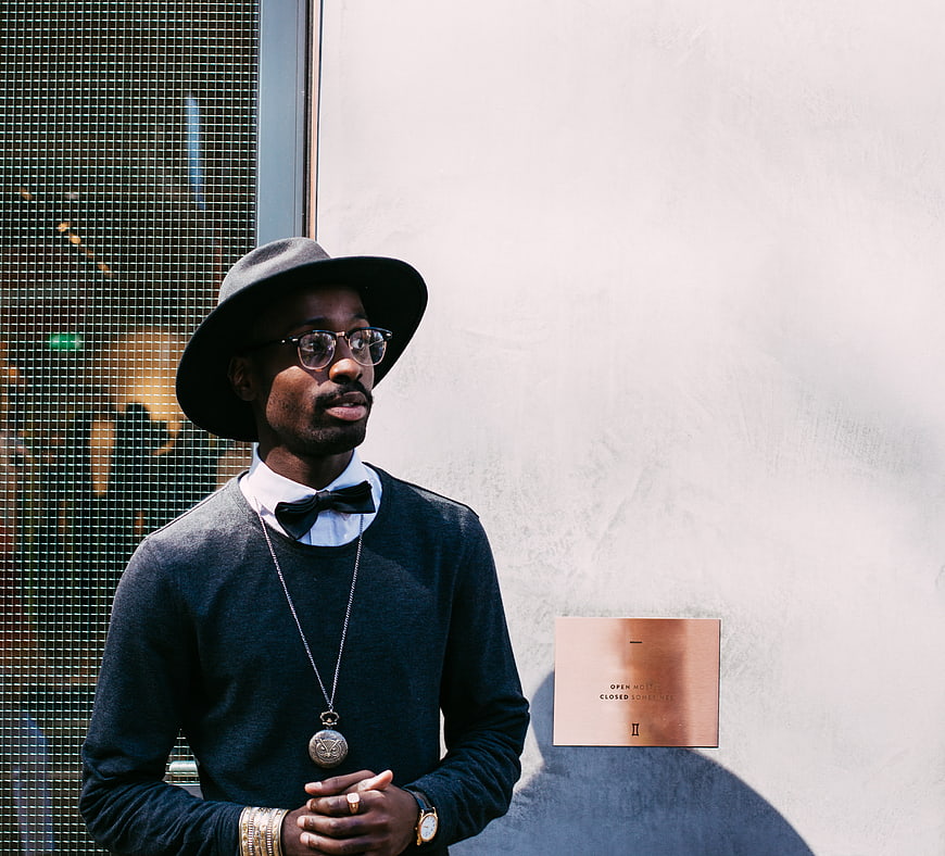 Stylish African American Man in Fedora and Bow Tie