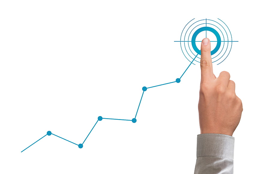 Businessman Hand Pointing At Target On Rising Growth Chart