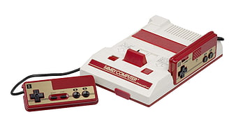 Nintendo Family Computer Console And Controller On White Background