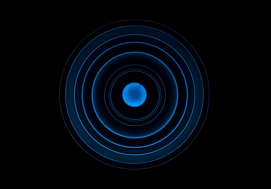 Abstract Blue Concentric Circles on Black Background