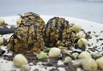 Chocolate Drizzled Energy Balls with Nuts and Shavings