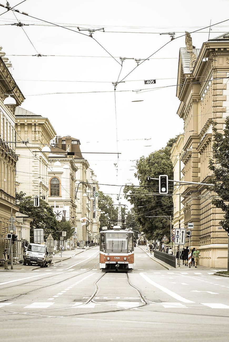 Vintage Tram on European City Street with Classic Architecture