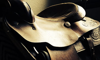 Close-up of vintage western leather horse saddle