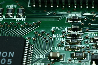 Close-up of Green Computer Circuit Board with Microchips