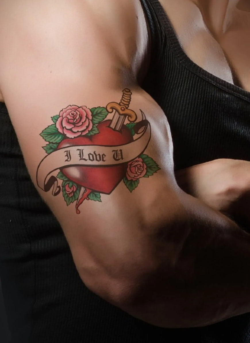 Traditional Heart and Dagger Tattoo on Arm