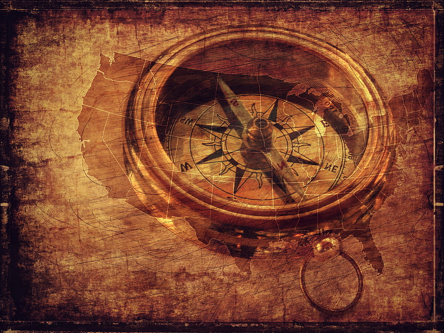 Vintage Compass Overlaid on Antique Map of United States