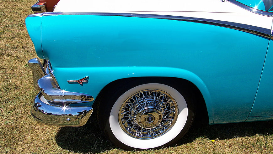Rear Detail of Vintage Turquoise Classic Car with Chrome Bumper