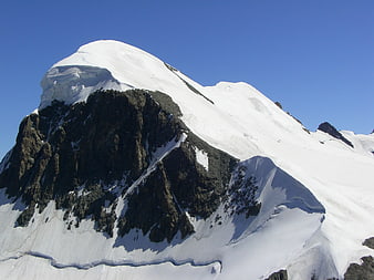 Snow-Covered Breithorn Peak in the Swiss Alps Under Clear Blue Sky