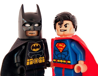 Lego Batman and Superman Minifigures Holding Hands