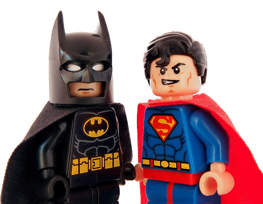Lego Batman and Superman Minifigures Holding Hands
