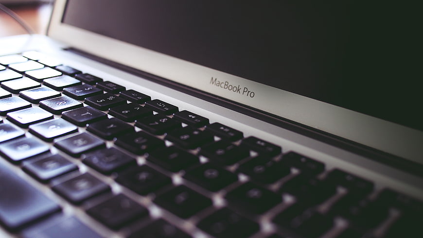 Close-up of MacBook Pro Keyboard and Screen Bezel