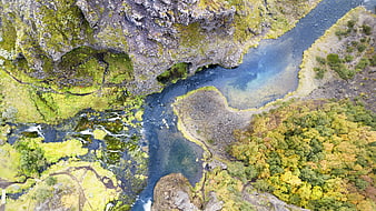 Aerial view of mossy river canyon in Iceland
