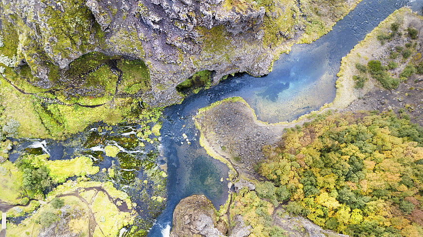 Aerial view of mossy river canyon in Iceland