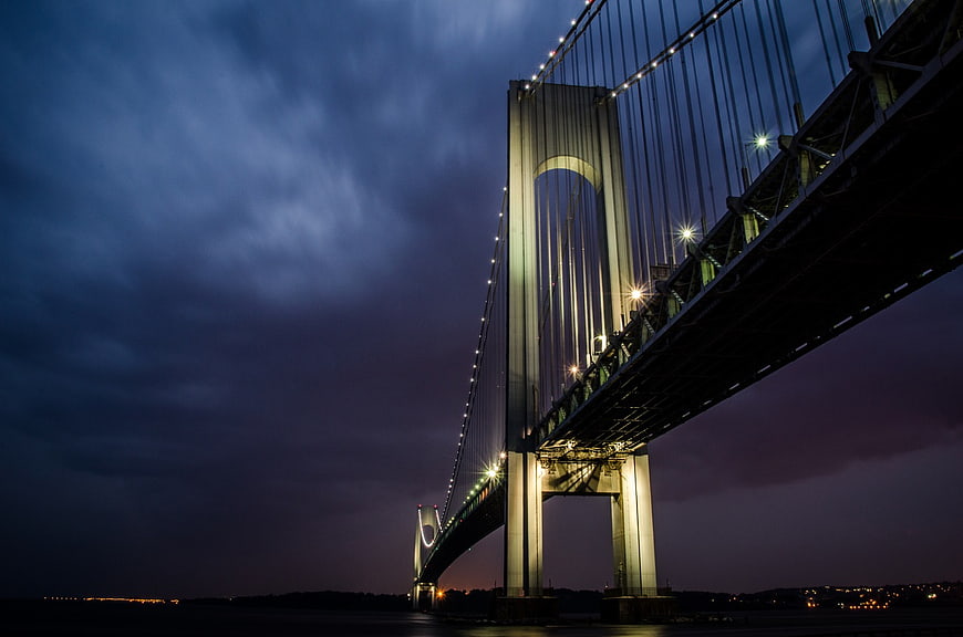 Dramatic Night View of Illuminated Suspension Bridge
