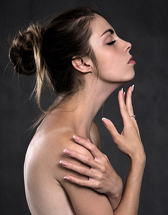 Elegant Profile Portrait of Woman with French Manicure