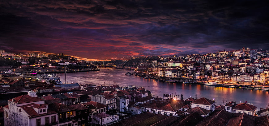 Porto Portugal Cityscape at Dusk with Dramatic Sunset Sky