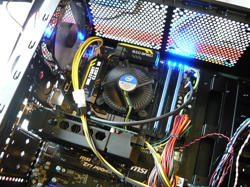 Interior of a gaming PC with RGB lighting and MSI motherboard