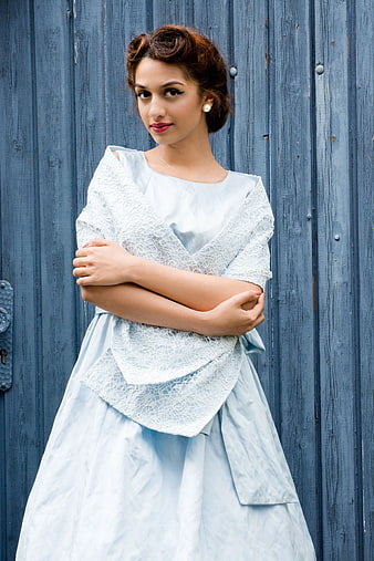 Portrait of Young Woman in Vintage Blue Dress