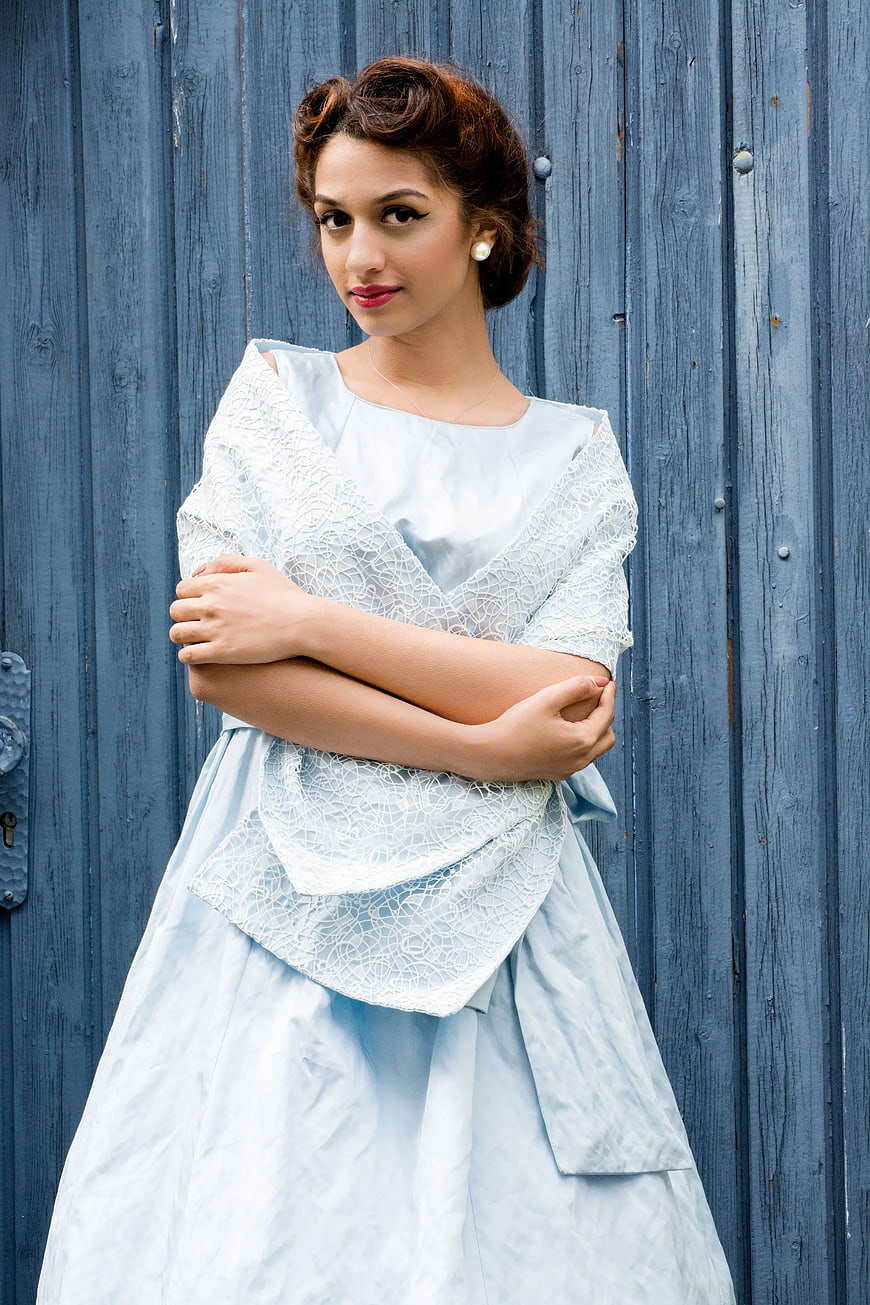 Portrait of Young Woman in Vintage Blue Dress