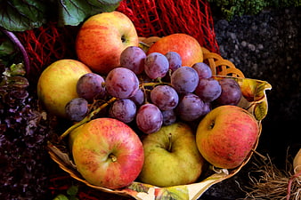 Rustic Fruit Basket With Apples And Grapes