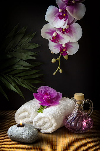 Spa Wellness Still Life With Orchids, Towels, And Candle